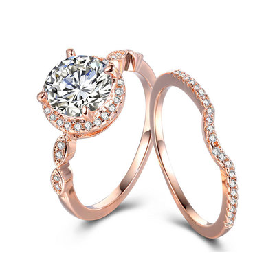 https://www.jewellylife.com/Round-Diamond-Rose-Gold-Halo-Engagement-Ring-Set.html
